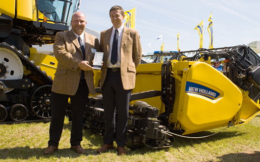 New Holland’s Dual Stream header, which offers increased harvesting capacity and reduced fuel consumption, took Gold in the harvest machinery section of the prestigious International Machinery Manufacturer’s Awards at Cereals 2015. New Holland’s combine product specialist, Nigel Honeyman (left), and marketing manager for the UK and Ireland, James Ashworth, are pictured with the award.