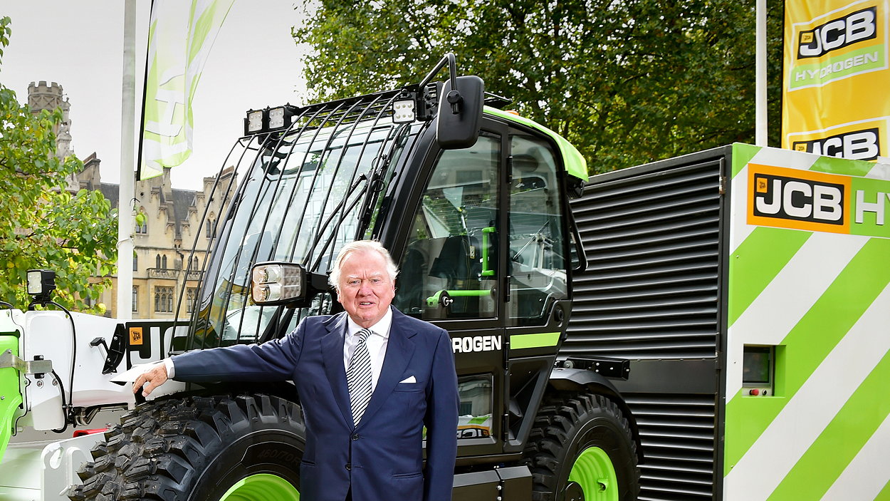 JCB chairman Lord Bamford pictured with the company's hydrogen-powered Loadall