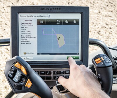 The Deere 6R's AutoSetup system makes tractor and implement settings much quicker and easier