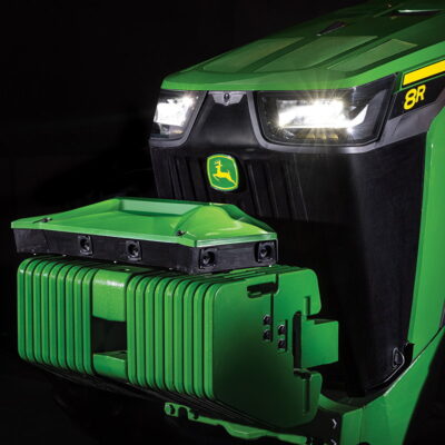 Three sets of stereo cameras mounted on the front weight block of Deere's new autonomous tractor