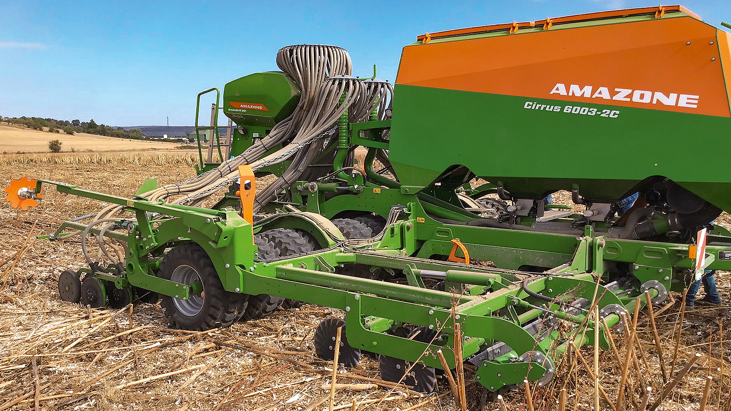 An Amazone Cirrus 6003-2C with the new knife roller sowing winter wheat after sunflowers