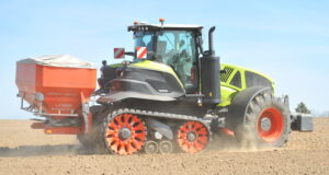 Claas' Axion Terra Trac tractor is now available with a narrow 457mm track for use in row-crop applications