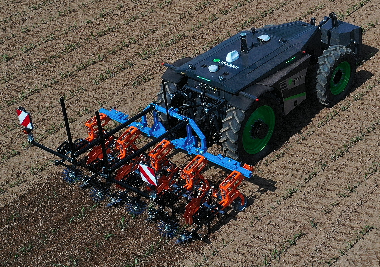 The AgXeed 2.055W4 agbot offers 75hp, a 4,000kg rear-linkage capacity and another 1,500kg on the front linkage