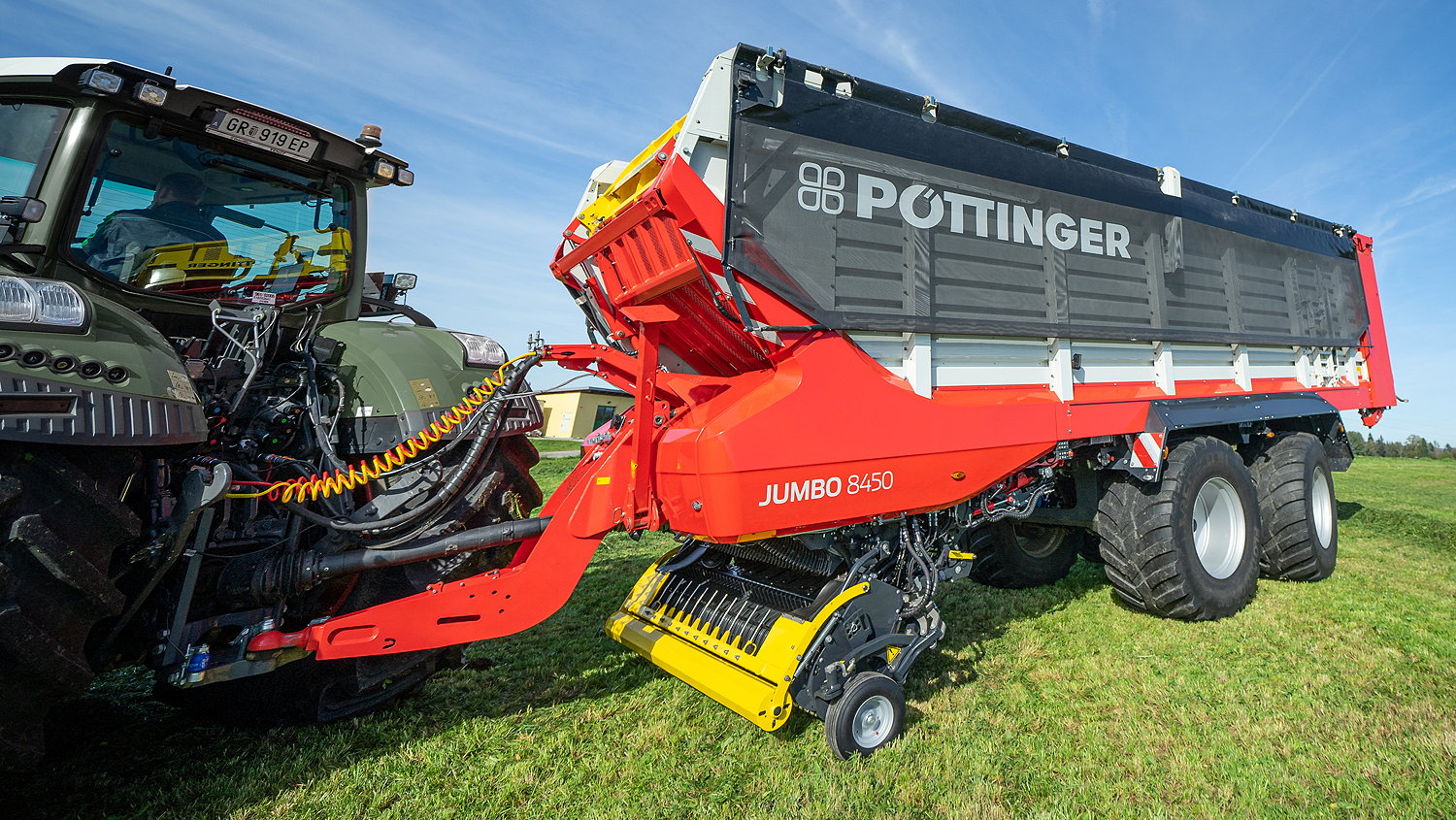 Pöttinger's Jumbo forage wagon is now available with a contactless electronic steered axle system, enabling tight turning angles.