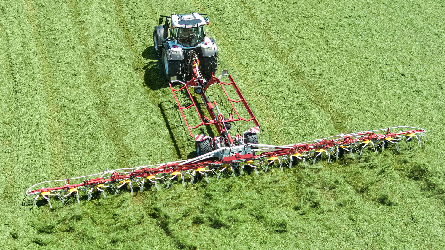 Pöttinger's new high-output Hit HT 17160 trailed tedder is 17m wide.