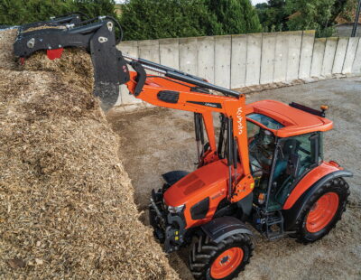 Kubota's M5112 tractor coupled with MX's LK1900H loader.