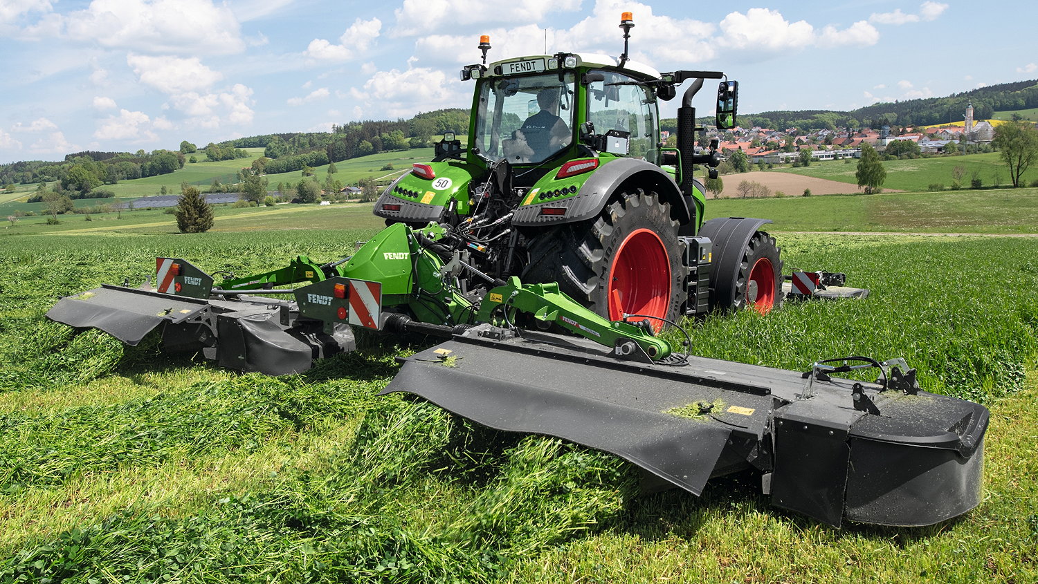 The 2023 Fendt Slicer 860 KC-RC butterfly rear mower.