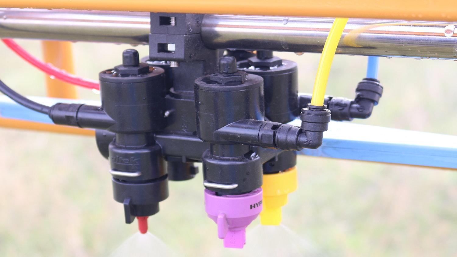 Knight Farm Machinery's Vario Select system operates by having a combination of four different nozzles at every spray point.