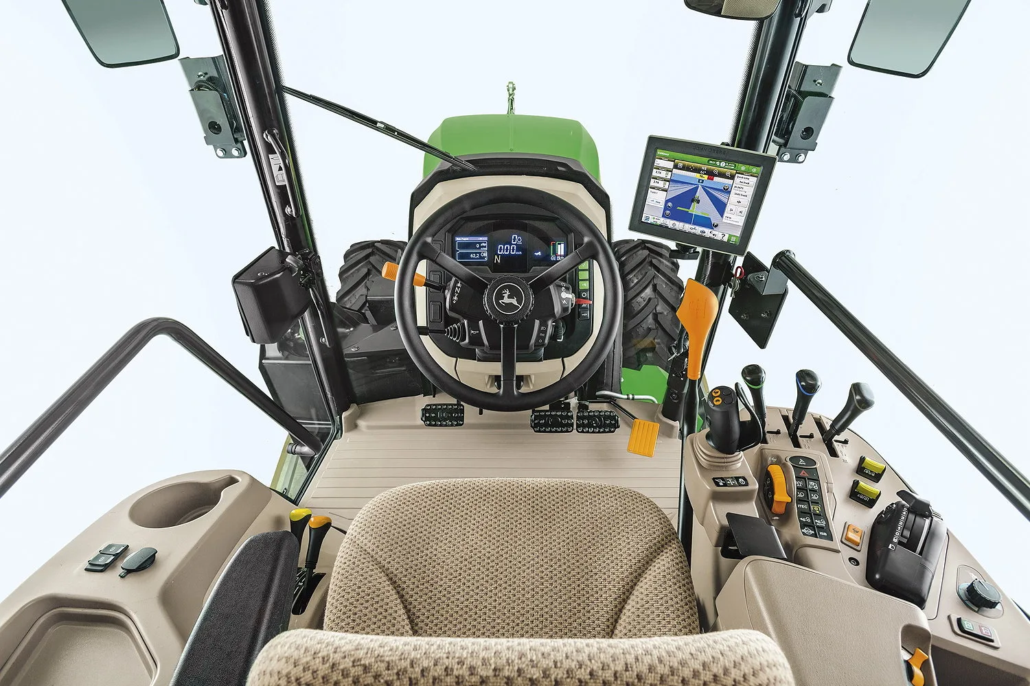 The cab on John Deere's new 5ML series has the AutoTrac display integrated directly into the dashboard.