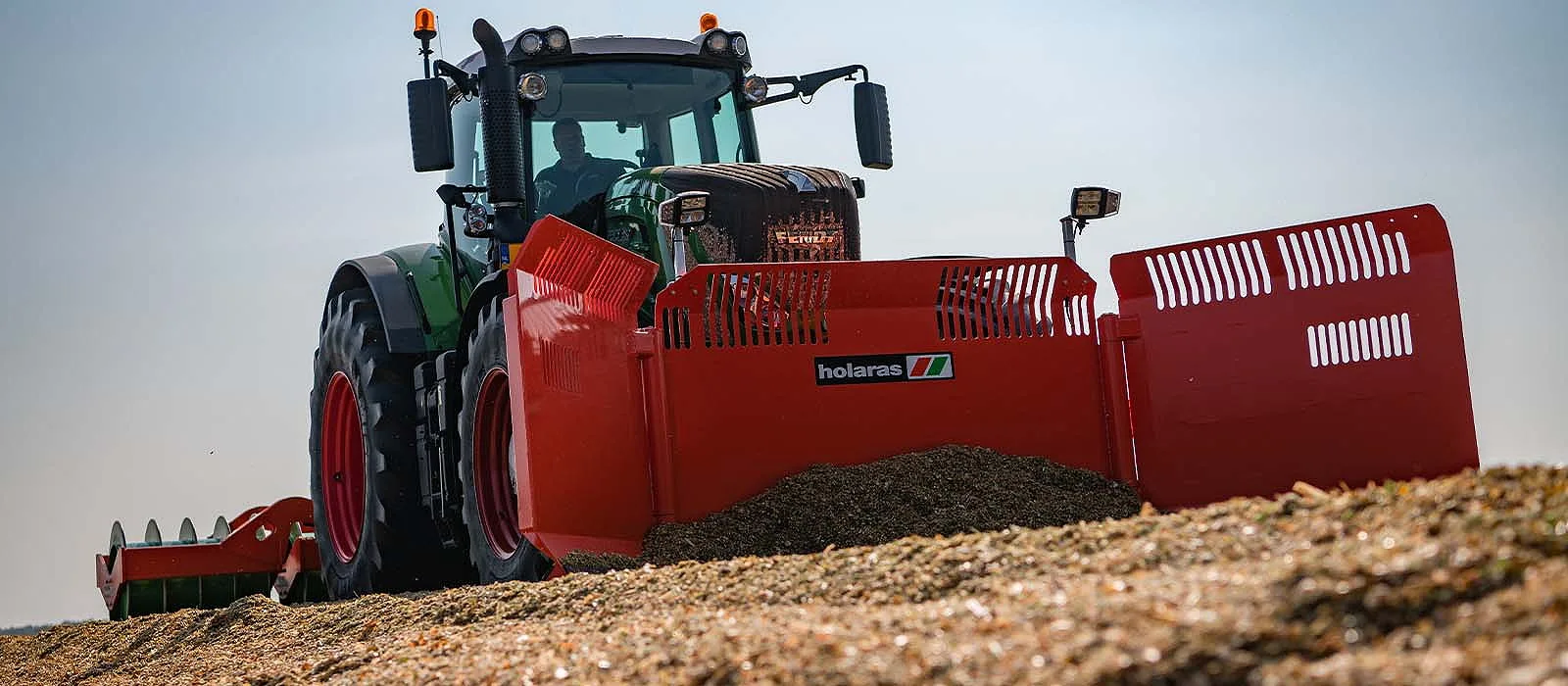 The Holaras offering includes silage handling equipment like this maize leveller.