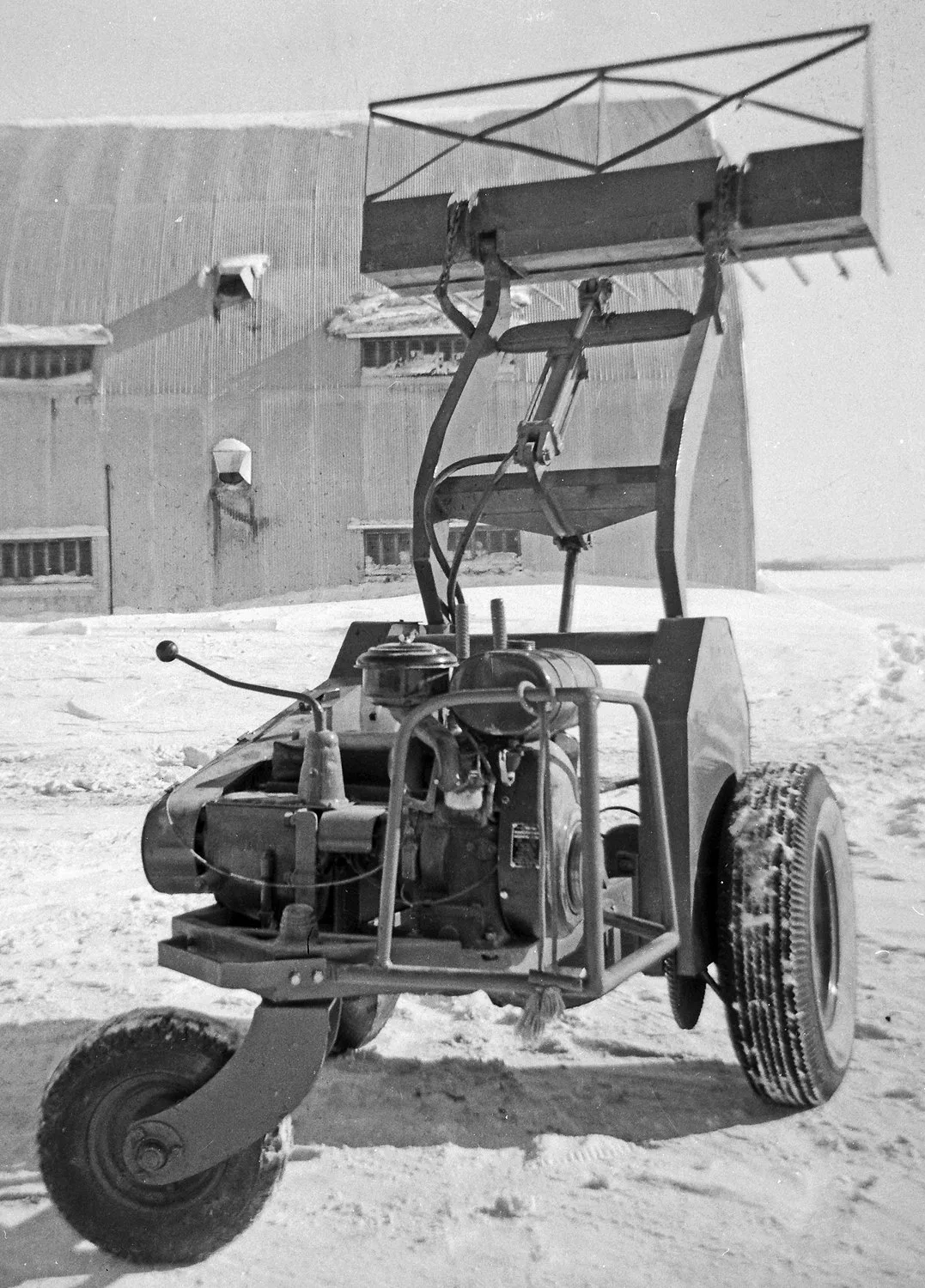 The Keller brothers' original three-wheeled turkey shed loader. 