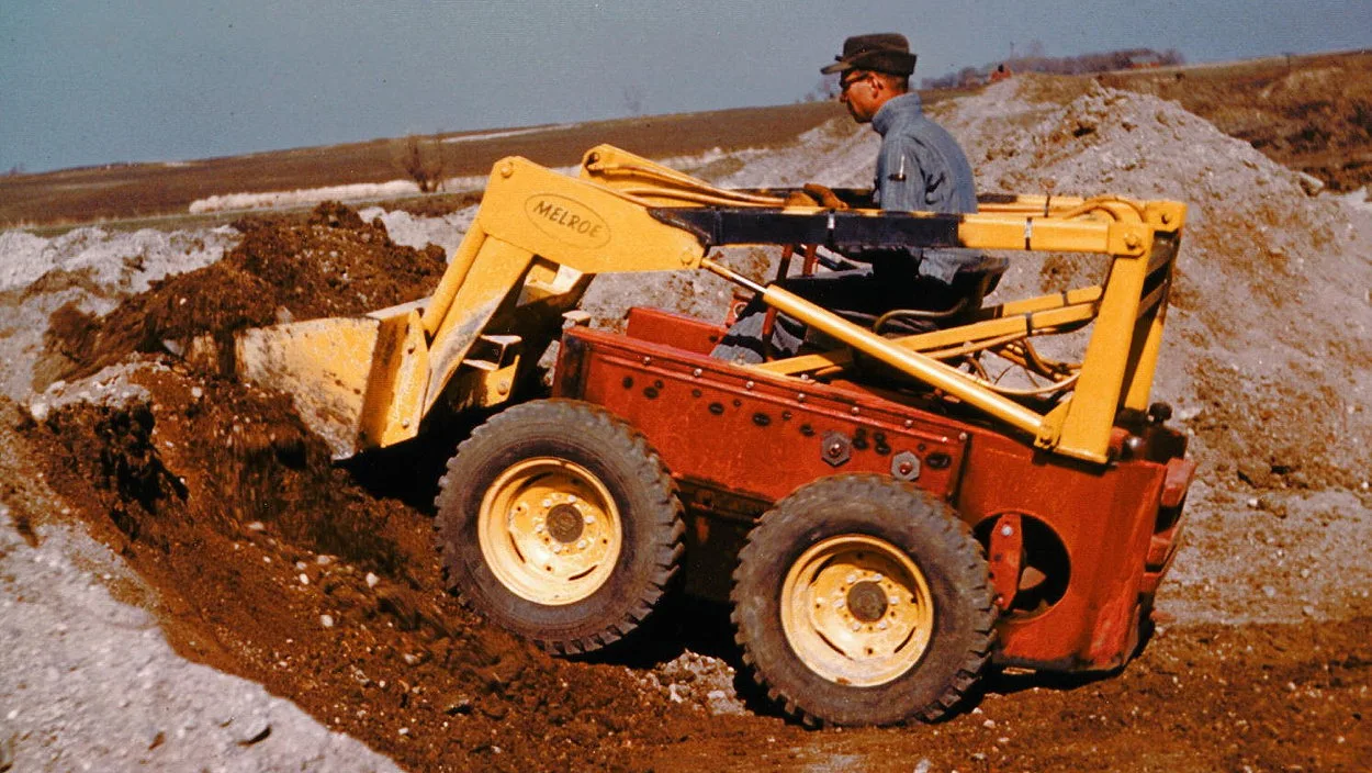 Louis Keller operating the Melroe M400 prototype that would become the first four-wheel skid-steer loader.