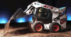 The Bobcat S7X skid-steer wheeled loader is powered by a 60.5kWh lithium-ion battery, features electric drive motors and utilises ball screw actuators for lift and tilt functions.