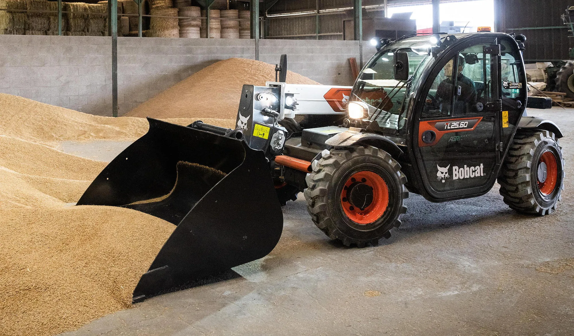 Bobcat's TL25.60 Agri has a rated operating capacity of 2500kg, a maximum lift height of 5.9m and a fully extended reach of 3.3m.