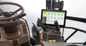 A John Deere 6R tractor fitted with the new G5 Plus CommandCenter that will be used in 2024 model year models.