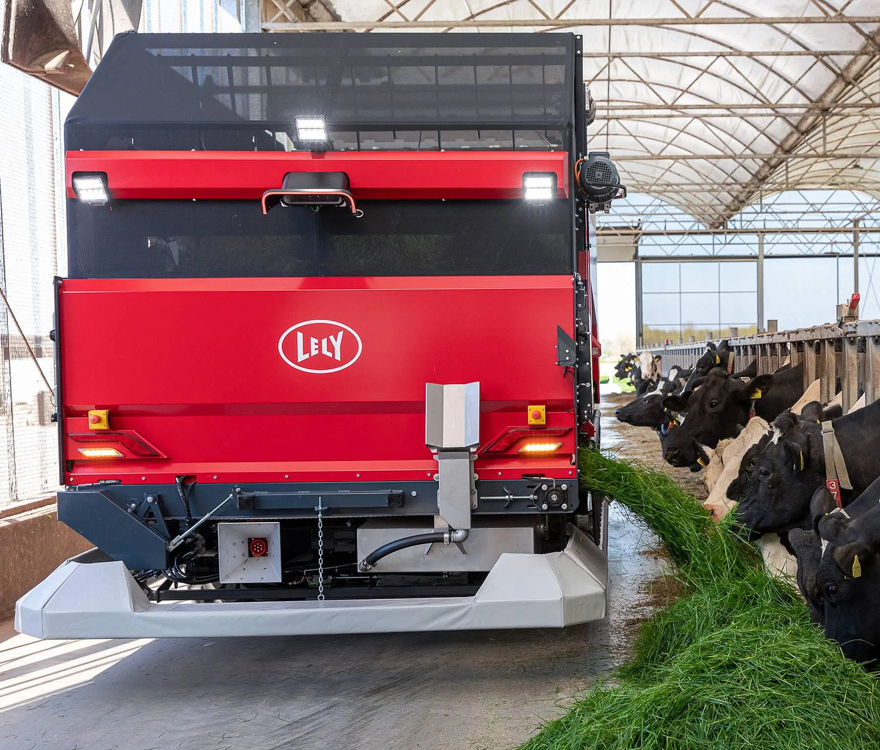 The Lely Exos operates day and night delivering fresh grass to dairy cows from nearby fields.